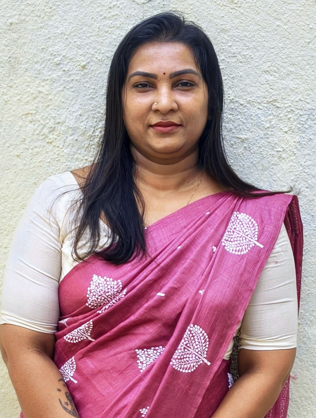 Mrs . Beena Mary 